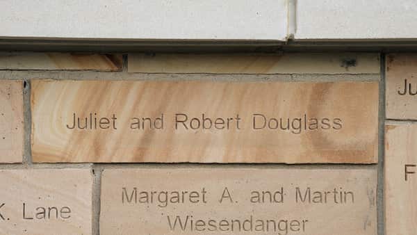 brick engraved with name Juliet and Robert Douglass