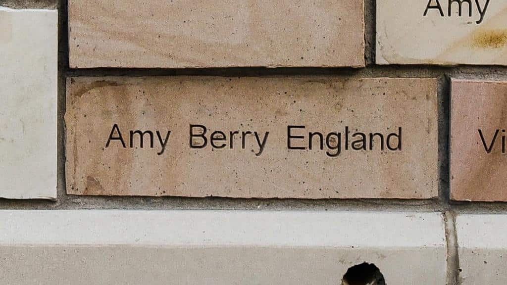 brick engraved with name Amy Berry England