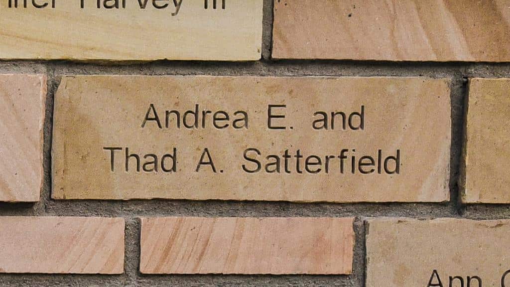 brick engraved with name Andrea E. and Thad A. Satterfield